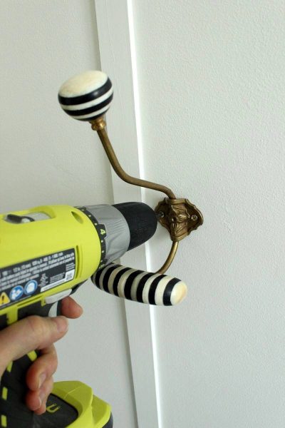 Attach the hooks on wall