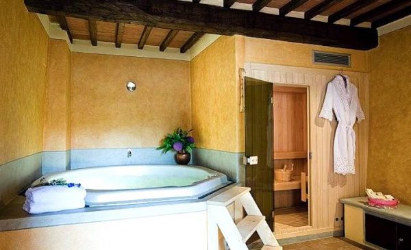 Tuscan style bathroom large bath