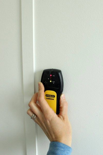 Use a studfinder to locate the studs 1